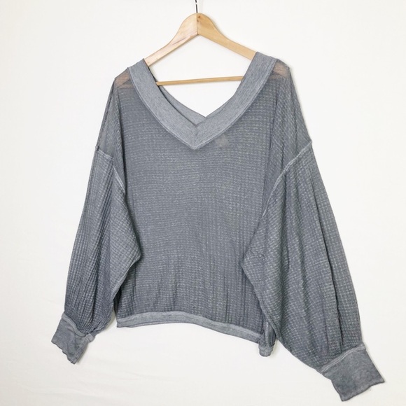 Free people with a free, gray, sheer oversized top - Picture 7 of 12